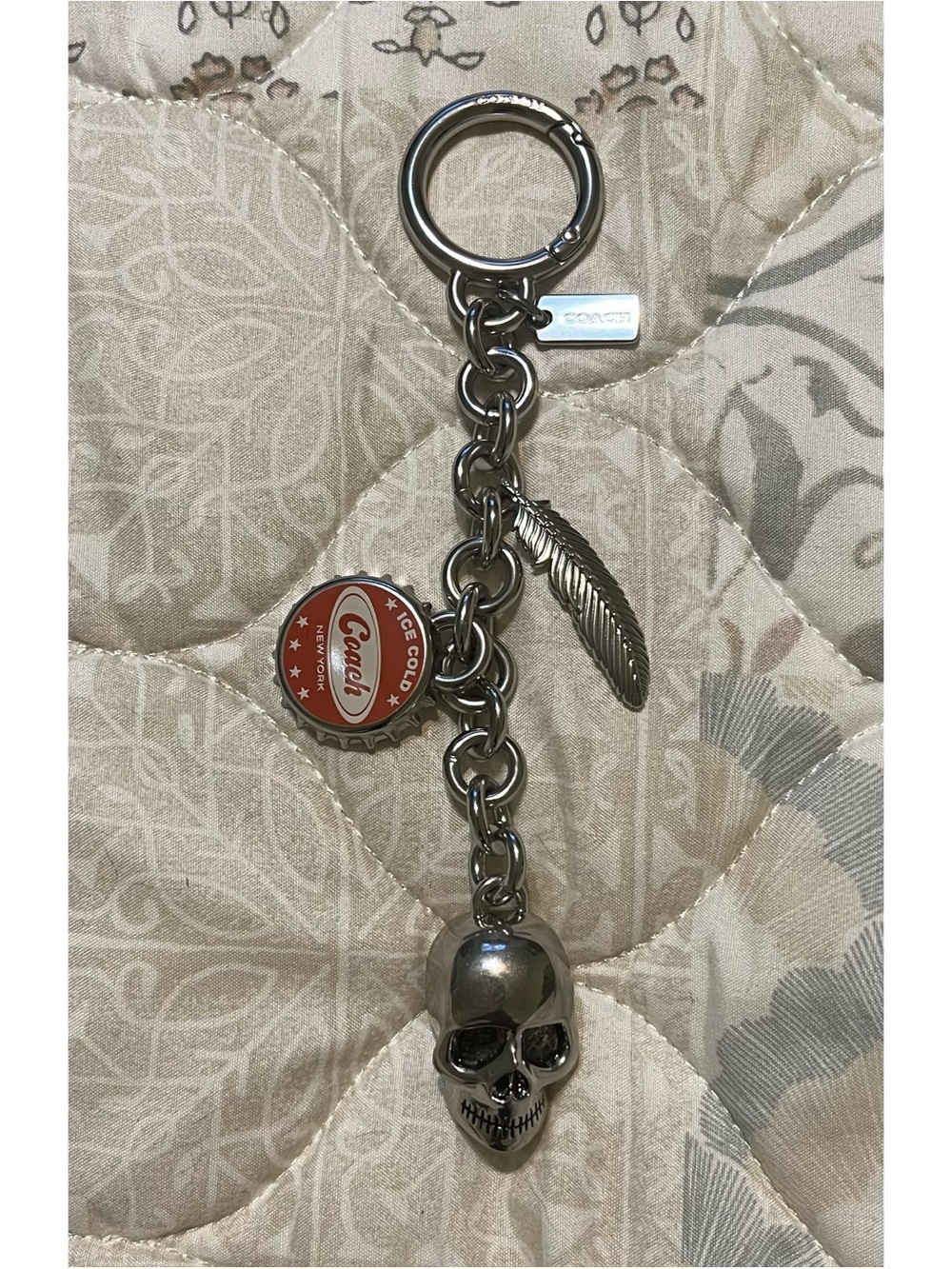Coach Skull Bottle Cap Feather Bag Charm in Silver!